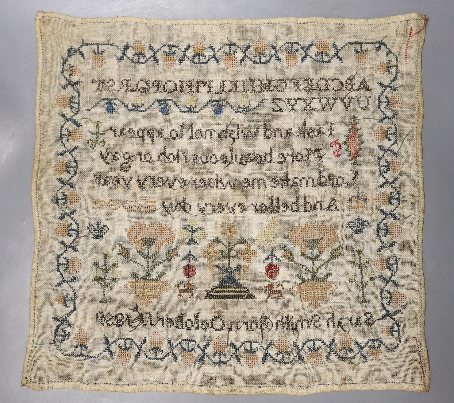 A 19th century cross stitch sampler by Sarah Smith, dated 1859 - 40 x 40cm